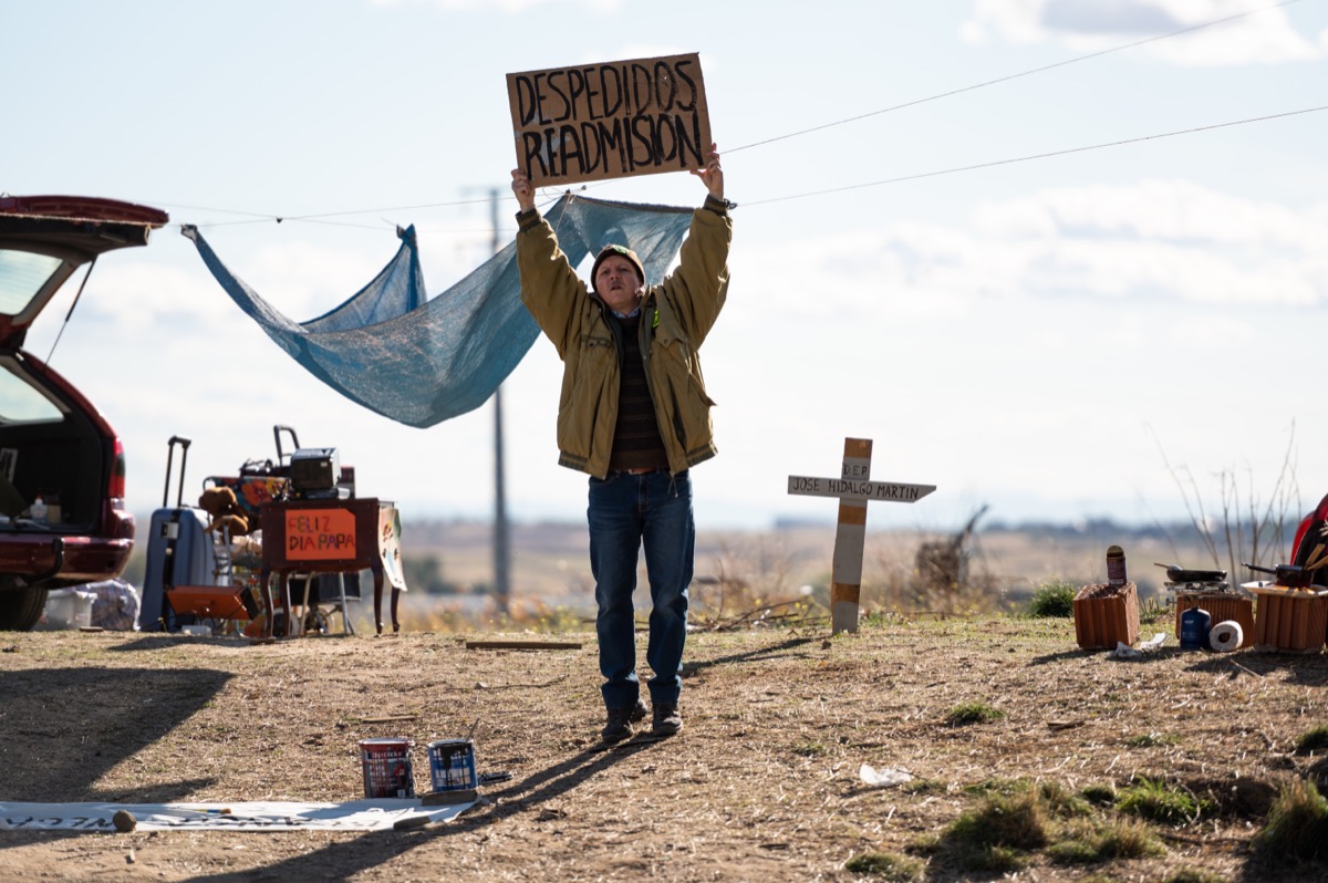Former employee Jose (Óscar de la Fuente) protests outside the factory in THE GOOD BOSS  (image provided by Cohen Media Group)